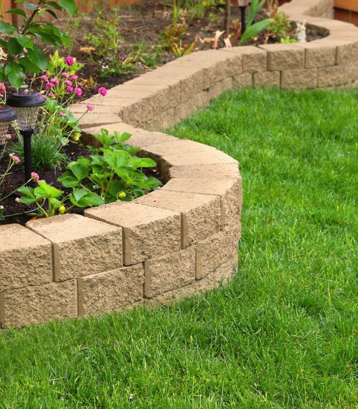 landscaped yard and green lawn
